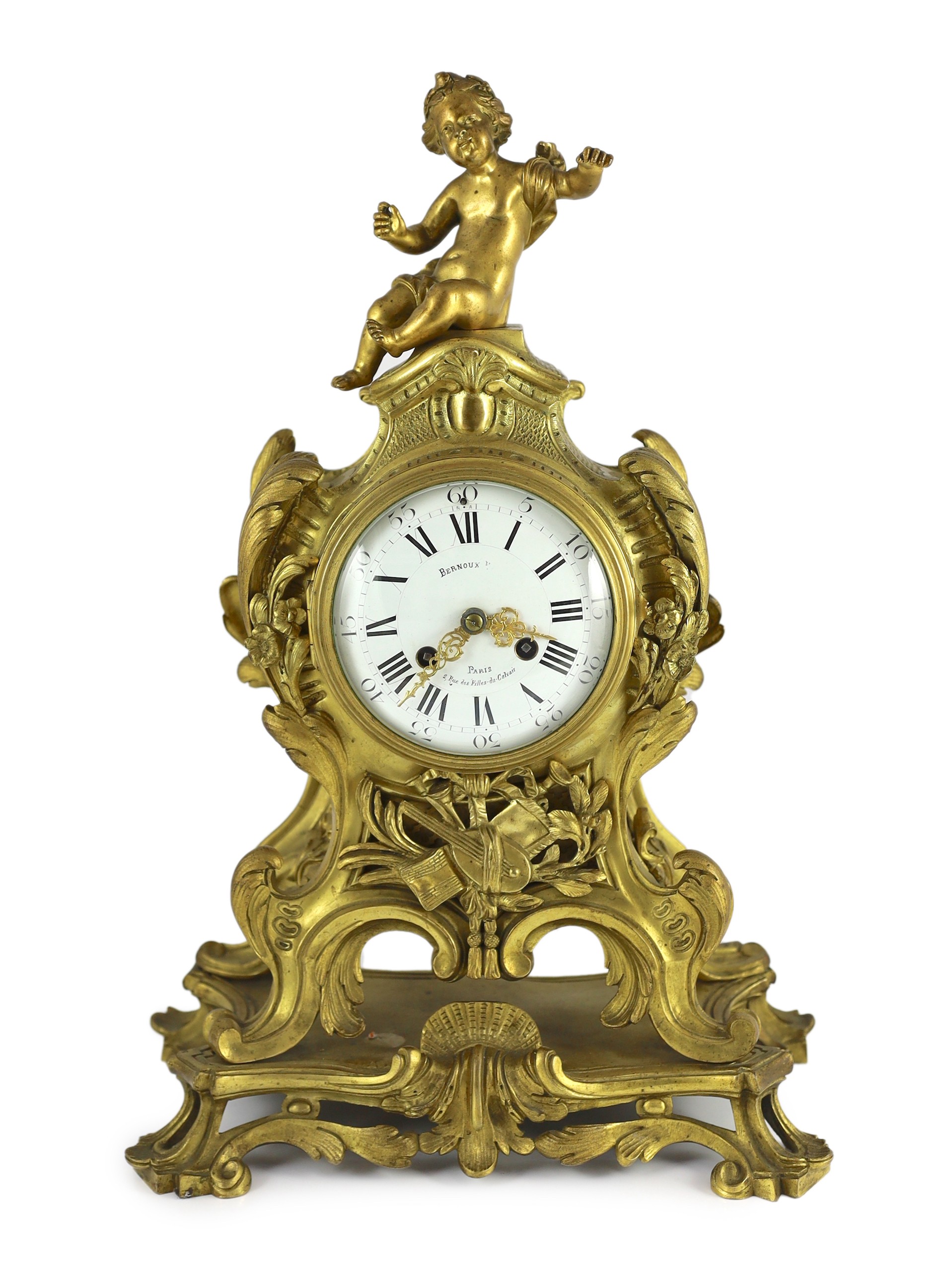 Bernoux of Paris. A 19th century Louis XV style ormolu mantel clock, 33cm wide, 48cm high